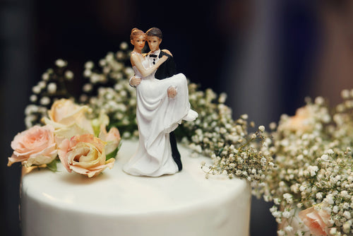 Budget-Friendly Wedding Cake Toppers: Adding Charm Without Breaking the Bank