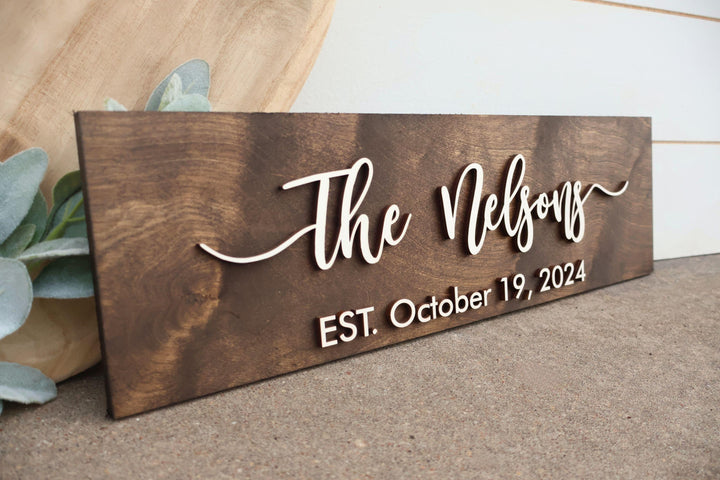 Custom Swoosh Last Name Sign